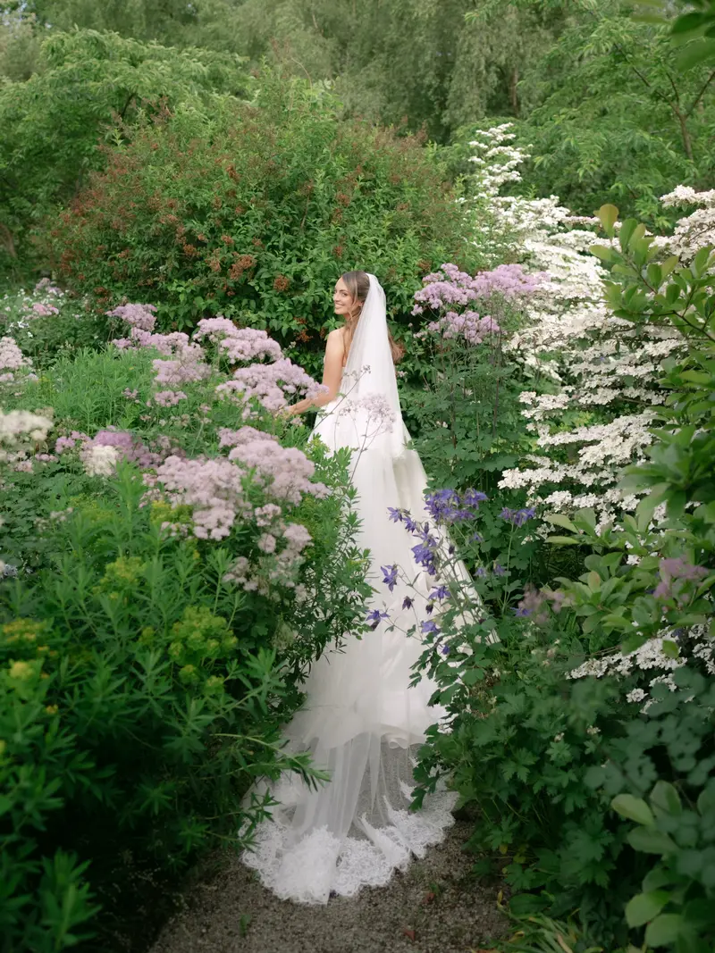 A bride among garden flowers